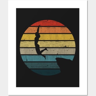 Cliff Diving Silhouette On A Distressed Retro Sunset graphic Posters and Art